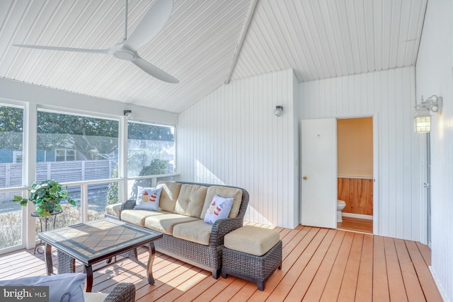 sunroom / solarium featuring vaulted ceiling and ceiling fan