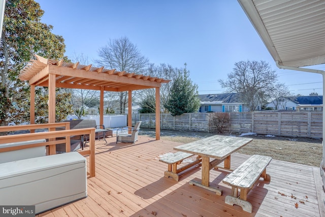 deck featuring a pergola and outdoor lounge area