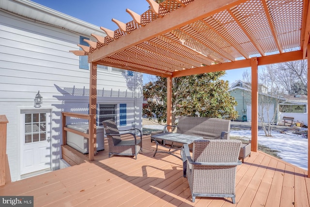 deck featuring area for grilling and a pergola