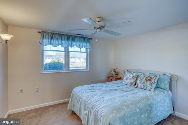 bedroom featuring ceiling fan and carpet floors