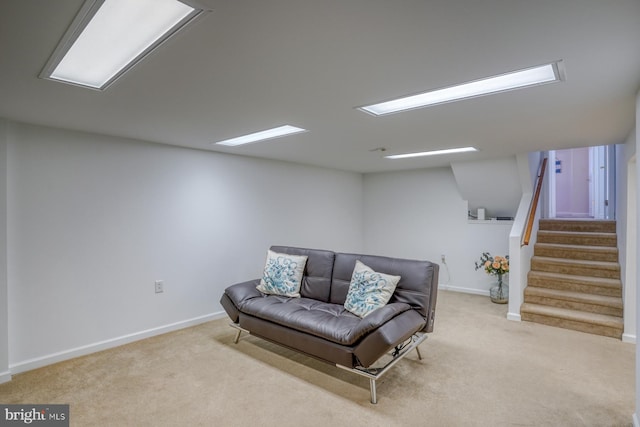 living area featuring light colored carpet