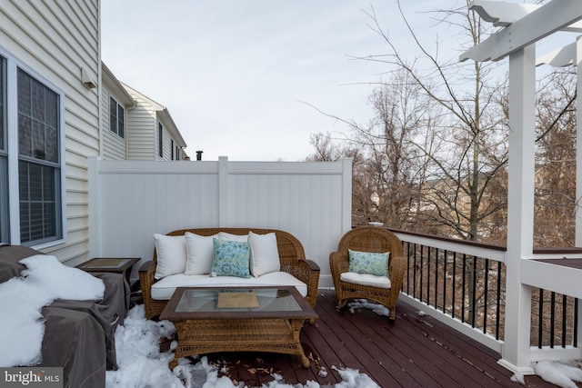 view of snow covered deck