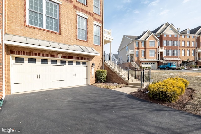 view of side of home with a garage