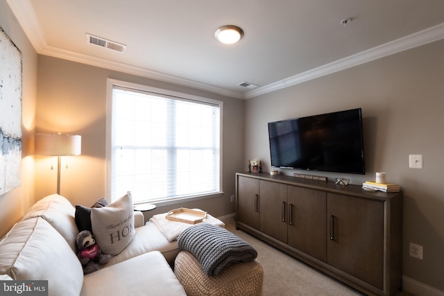 living room featuring ornamental molding, light carpet, and a wealth of natural light