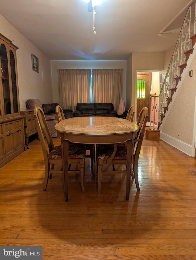 dining room with light hardwood / wood-style flooring