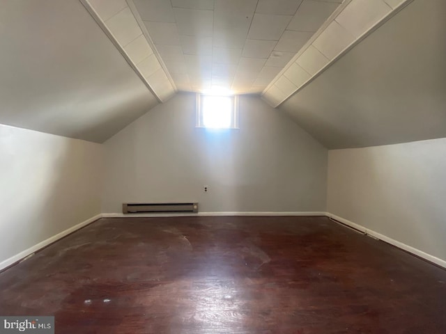 bonus room with lofted ceiling and baseboard heating