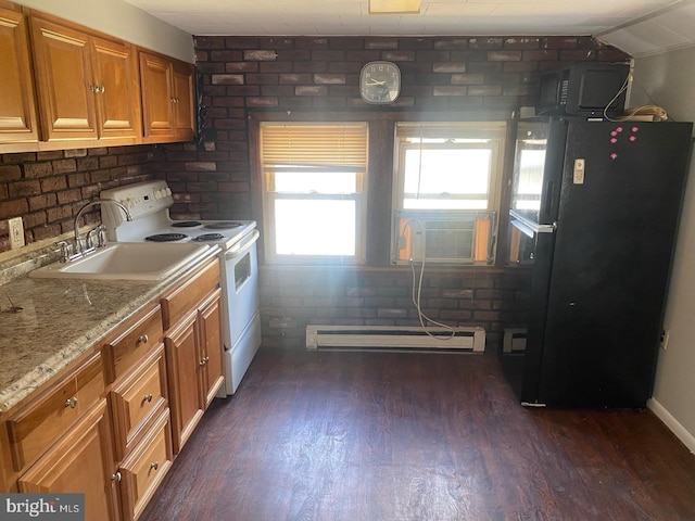 kitchen featuring sink, dark hardwood / wood-style floors, black appliances, light stone countertops, and a baseboard radiator