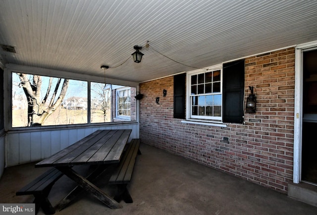 view of patio with a porch and visible vents