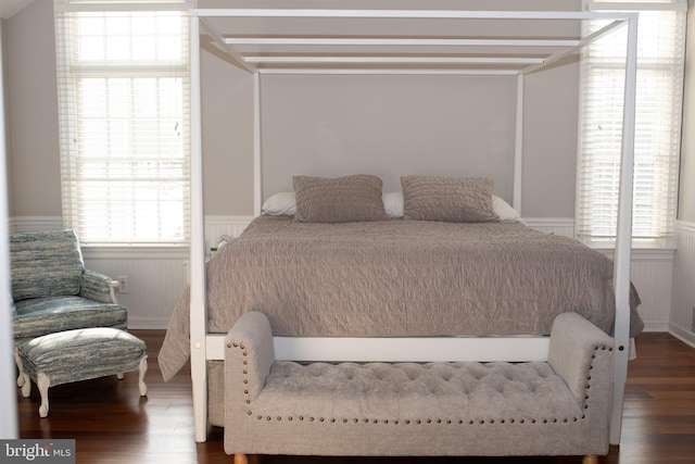 bedroom with wood-type flooring