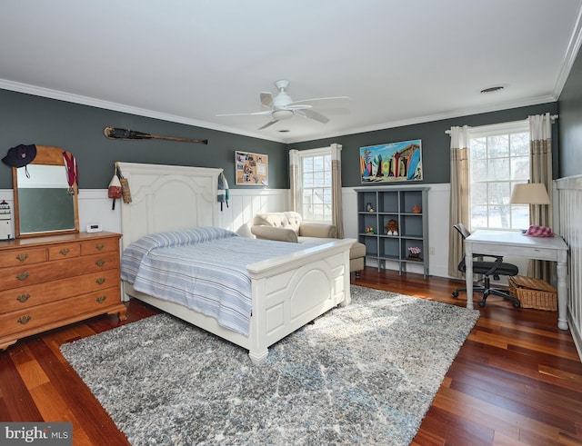 bedroom featuring multiple windows, crown molding, and dark wood-type flooring