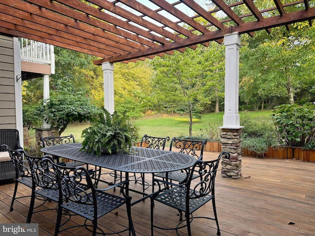 wooden deck featuring a pergola