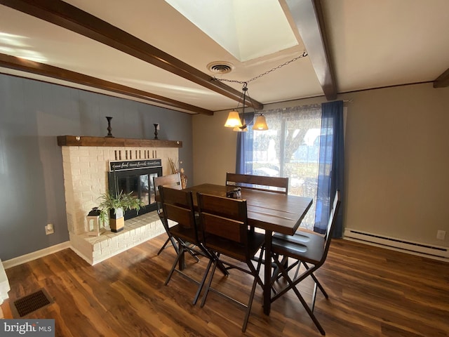 dining area with a fireplace, dark hardwood / wood-style floors, beamed ceiling, and baseboard heating