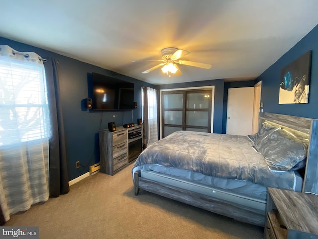 bedroom with light carpet and ceiling fan