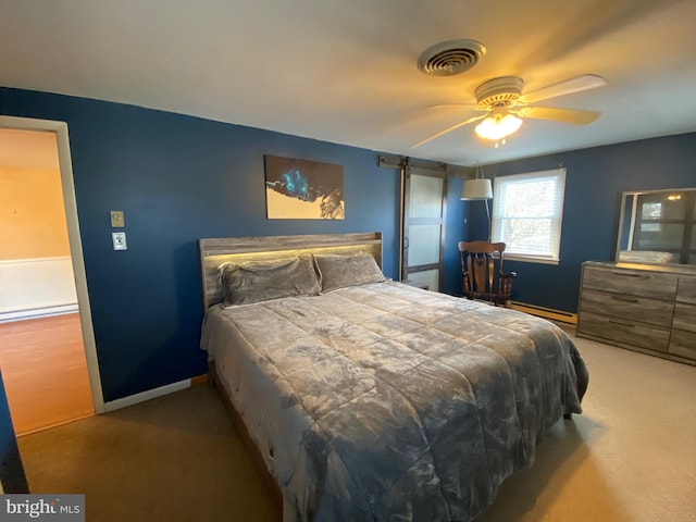 bedroom featuring carpet floors, ceiling fan, and baseboard heating