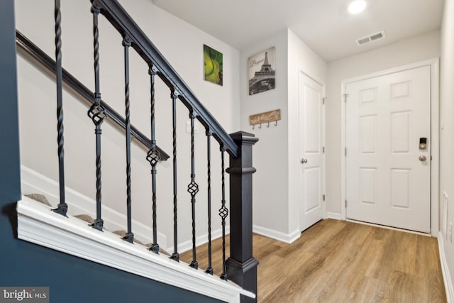 entrance foyer with light wood-type flooring