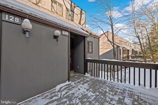 view of snow covered deck