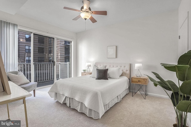 carpeted bedroom featuring access to exterior and ceiling fan