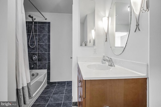 bathroom featuring tile patterned flooring, vanity, and shower / tub combo with curtain