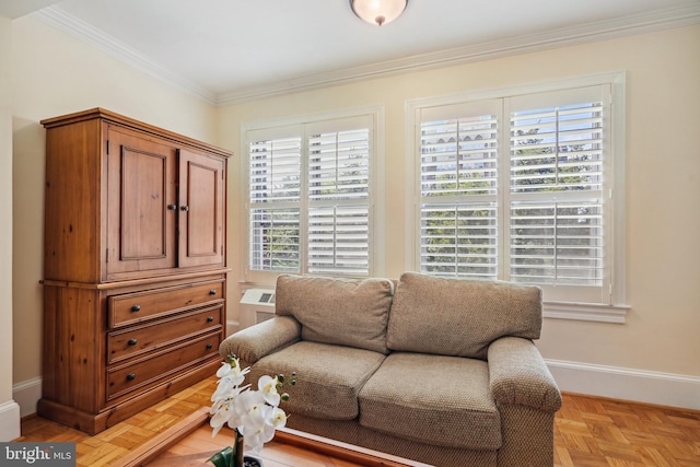 sitting room with light parquet flooring and crown molding