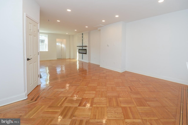 empty room with light parquet flooring