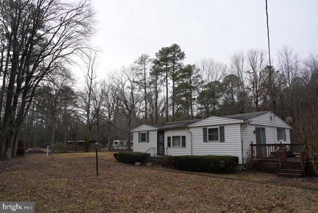 view of front of house featuring a deck