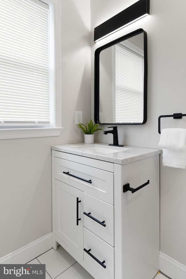 bathroom featuring vanity and tile patterned flooring