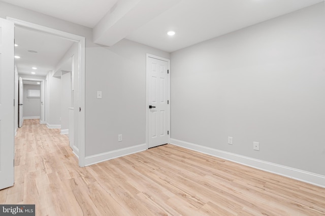 unfurnished room with light hardwood / wood-style flooring