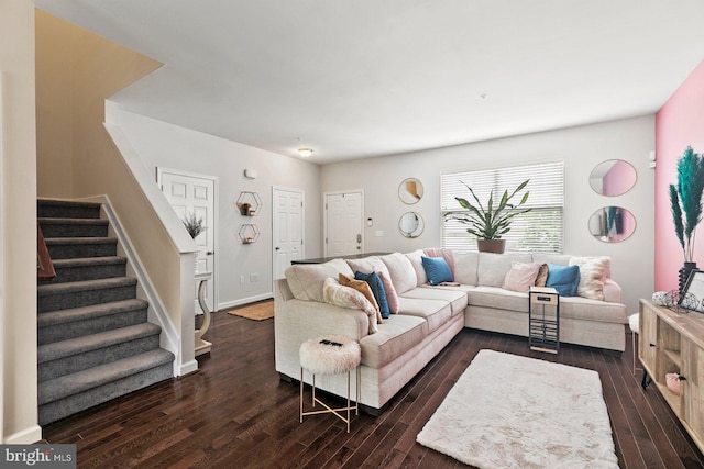 living room with dark hardwood / wood-style flooring