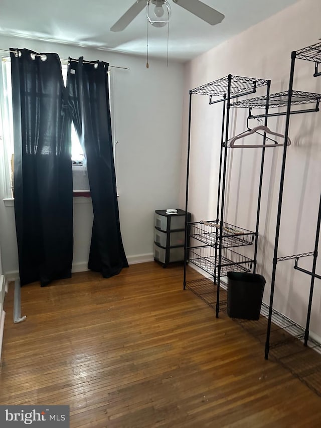 unfurnished bedroom with hardwood / wood-style floors