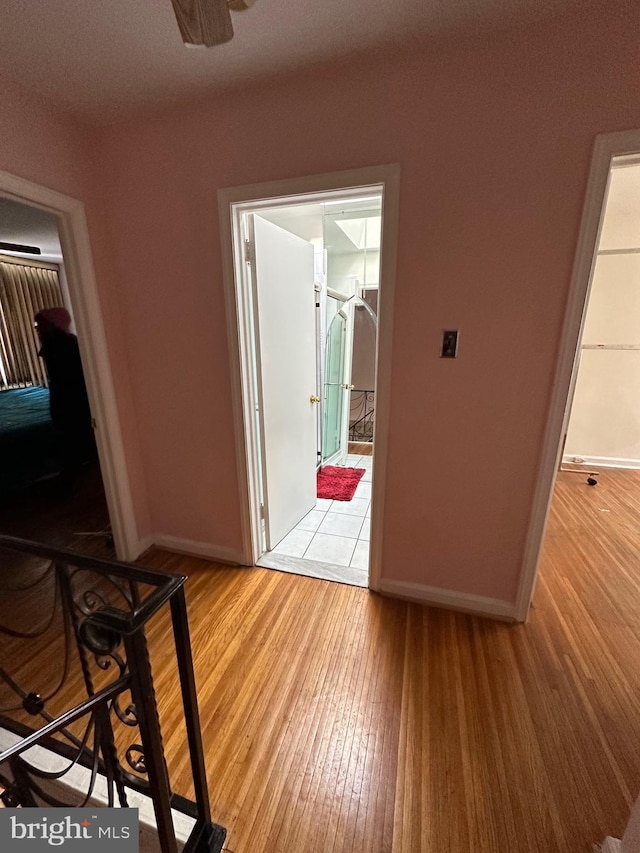 corridor featuring light hardwood / wood-style flooring