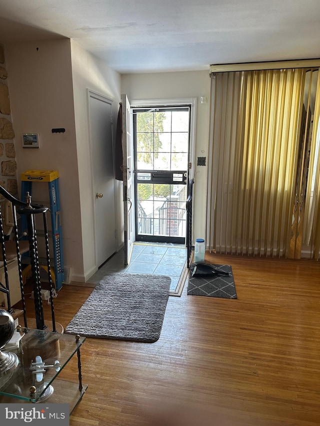 doorway to outside featuring light hardwood / wood-style floors