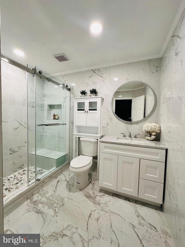 full bathroom with toilet, vanity, visible vents, marble finish floor, and a marble finish shower