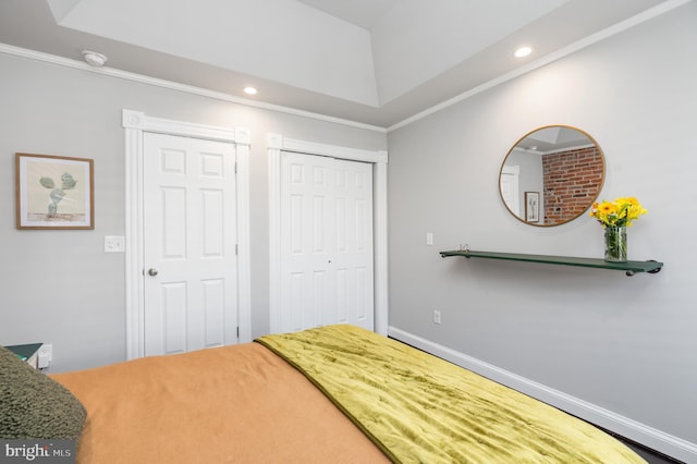 bedroom with ornamental molding