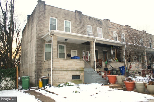 multi unit property featuring a porch