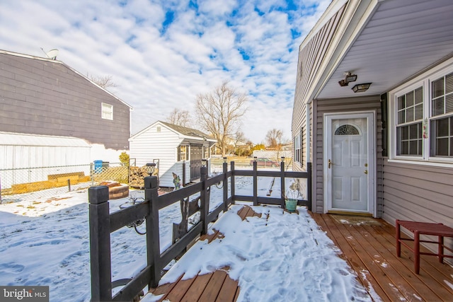 view of snow covered deck