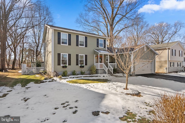 view of front of property featuring a garage