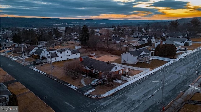 view of aerial view at dusk