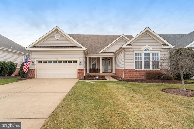 view of front facade with a garage and a front yard