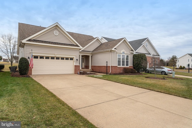 view of front facade featuring a garage and a front yard