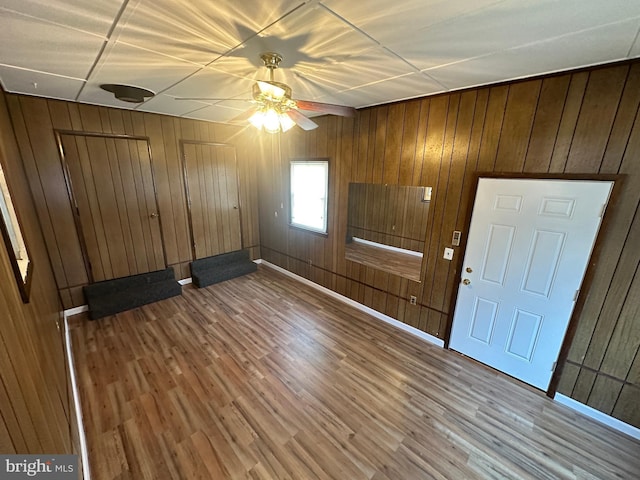 spare room featuring hardwood / wood-style flooring and ceiling fan