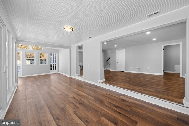 unfurnished living room with hardwood / wood-style flooring