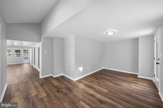 spare room with dark hardwood / wood-style flooring