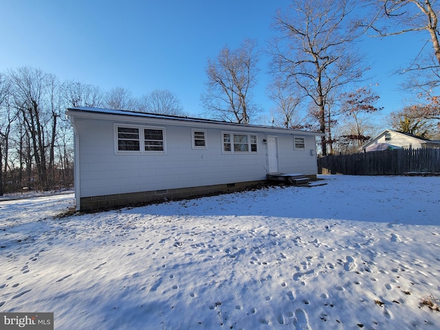 view of snow covered property