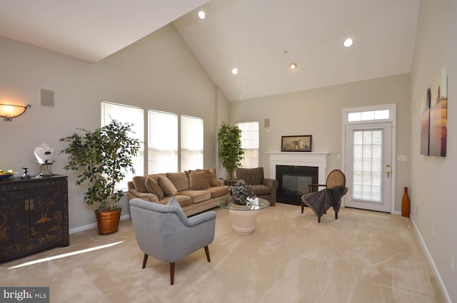 living room featuring light carpet and high vaulted ceiling