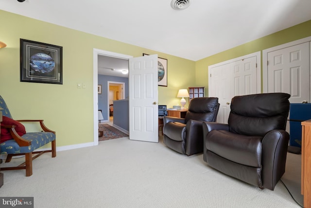 living area with carpet flooring