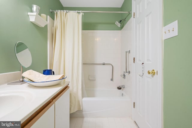 bathroom featuring vanity and shower / tub combo