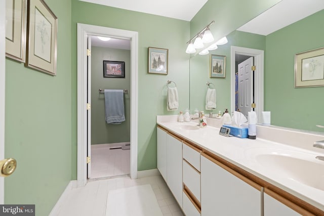 bathroom featuring vanity and tile patterned floors