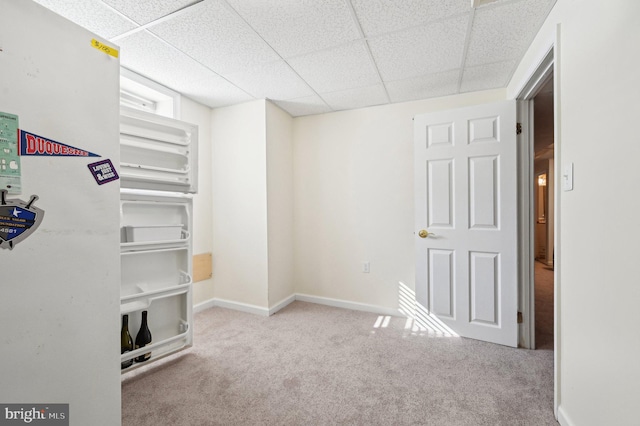 interior space featuring a paneled ceiling