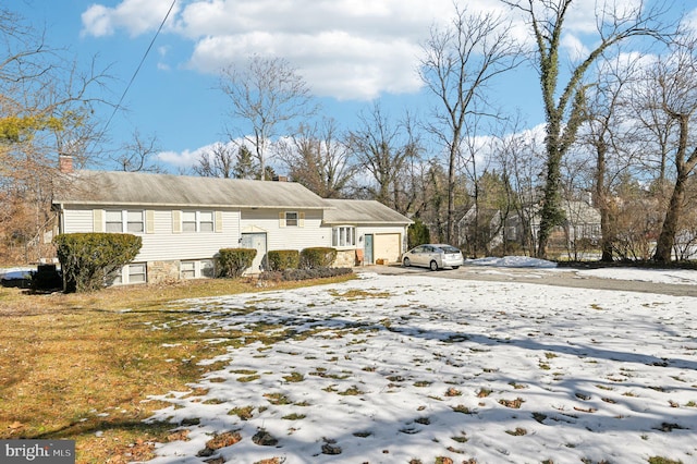 view of snow covered property