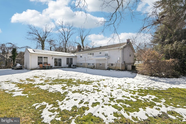 view of snow covered property